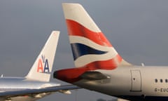 The tails of British Airways and American Airlines planes - London Heathrow, United Kingdom<br>B2YNBP The tails of British Airways and American Airlines planes - London Heathrow, United Kingdom