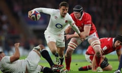 England’s Alex Mitchell escapes from the tackle of Wales’ Adam Beard during the Six Nations match at Twickenham.