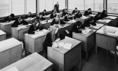 A classroom during an examination at a secondary modern school, circa 1970s