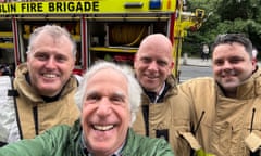 Henry Winkler takes a selfie with firefighters outside Dublin’s Shelbourne hotel