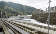 Magnetically levitating train on a test run in Japan.