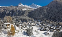 Champoluc village and wooded mountains