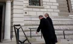 People going to work in traditional clothing, who may be civil servants, Whitehall, London.