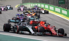 FILE PHOTO: Formula One F1 - Brazilian Grand Prix - Autodromo Jose Carlos Pace, Interlagos, Sao Paulo, Brazil - November 17, 2019  Ferrari's Sebastian Vettel and Mercedes' Lewis Hamilton in action at the start of the race  REUTERS/Ricardo Moraes/File Photo