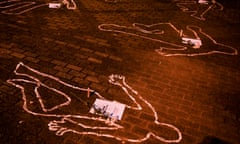 Silhouettes drawn on the ground to protest at killings
