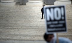 police officer watches protest