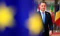 Belgium's prime minister Alexander De Croo behind an EU flag