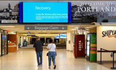 A screen above the entrance to the baggage claim area displays a Microsoft error message on Friday, July 19, 2024 at the Portland International Jetport in Portland, Maine.