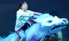 No strings attached … Mone Kamishiraishi as Chihiro rides the giant puppet dragon Haku in Spirited Away