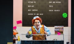 Rebecca Evans as Despina in Cosi fan Tutte at Wales Millennium Centre, Cardiff. Evans is a canteen assistant behind a cafe counter