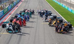 F1 drivers pose on the grid with their cars