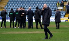 The Rangers manager, Philippe Clement, waits on the result of the pitch inspection at Dens Park