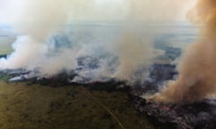 An aerial photo shows bush fires, started by farmers, in the Democratic Republic of the Congo. 