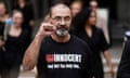 Andrew Malkinson pumps his fist outside the Royal Courts of Justice in London