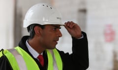 Rishi Sunak in a white hard hat and yellow hi-vis vest