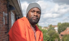 Dwayne Fields outside his old flat in Stoke Newington, London.