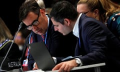 Members of the Australia’s delegation to the COP25 UN climate talks in Madrid  attend a meeting with delegates on 14 December.