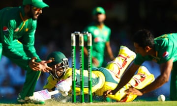 Australia’s batsman Matthew Wade dives to make his ground during the one-day international cricket match between Pakistan and Australia at the Gabba.
