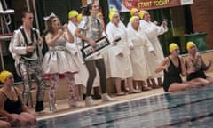 Joyful … George Hicks, Sophie Gunn and Eleanor Isherwood with the choir in Take On Me at the Rossmore Leisure Centre in Poole.