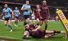 Queensland’s Darius Boyd crosses over to score during State of Origin Game three