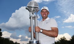 Charl Schwartzel of South Africa celebrates victory with the trophy after the final round of the Tshwane Open