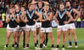 Port Adelaide players look on after their AFL match against Adelaide in 2024