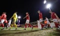 The teams walk out on to the pitch for Crewe’s home game against Sutton United