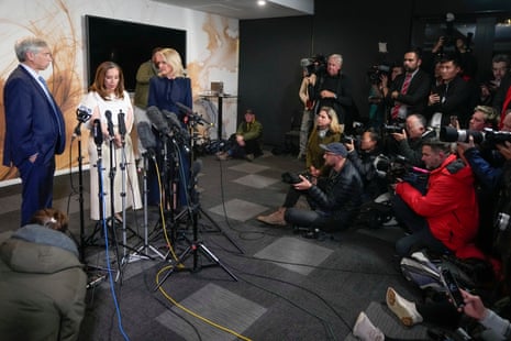 Stella Assange, second left, stands with lawyers, Jennifer Robinson and Barry Pollack at a press conference.