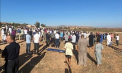 People attend funeral