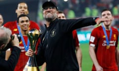 Jürgen Klopp celebrates with the Club World Cup trophy after Liverpool’s 1-0 win against Flamengo