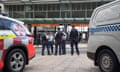 Police stand outside North Sydney station