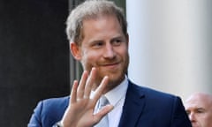 Prince Harry outside high court in London waving