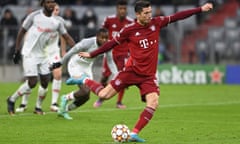 FBL-EUR-C1-BAYERN MUNICH-SALZBURG<br>Bayern Munich's Polish forward Robert Lewandowski scores from the penalty spot during the UEFA Champions League last-16, second-leg football match FC Bayern Munich vs RB Salzburg in Munich, southern Germany on March 8, 2022. (Photo by CHRISTOF STACHE / AFP) (Photo by CHRISTOF STACHE/AFP via Getty Images)