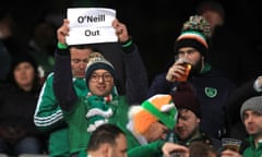 Republic of Ireland fans hold up a banner reading ‘O’Neill out’ in Aarhus.