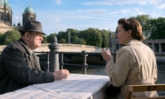 brendan gleeson and emma thompson seated at a waterside cafe in alone in berlin