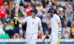 Harry Brook (left) celebrates reaching 150 during a huge fourth-wicket partnership with Joe Root