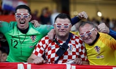 The Croatia fans cheer on their side in replica shirts and snazzy sunglasses.