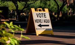 A "vote here" sign outside a polling location