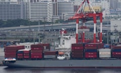 A freighter is anchored at the international container pier at Tokyo port.