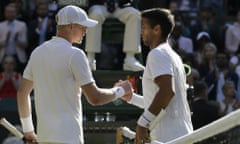 Fernando Verdasco, right, is congratulated by Kyle Edmund after his victory over five sets at Wimbledon.