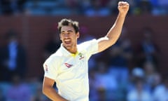 Mitchell Starc of Australia celebrates after taking the wicket of Craig Overton in the second Ashes test at Adelaide.