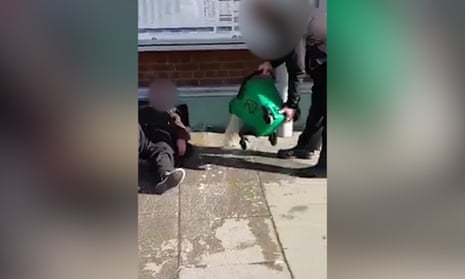 Southern rail staff pour bucket of water on homeless man – video 