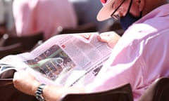 Man reading newspaper