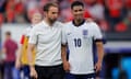 The England manager, Gareth Southgate, and Jude Bellingham react after the draw with Denmark.