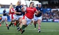 Ffion Lewis of Wales runs in to score her side’s winning try against Scotland