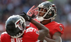 Kyle Pitts, the Falcons tight end, celebrates scoring the opening touchdown during the NFL London match between New York Jets and Atlanta Falcons at the Tottenham Hotspur Stadium.