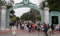 FILE - Students make their way through the Sather Gate near Sproul Plaza on the University of California, Berkeley, campus Tuesday, March 29, 2022, in Berkeley, Calif. The Supreme Court is expected to announce major decisions Friday on President Joe Biden's student loan forgiveness program and a case that impacts gay rights. (AP Photo/Eric Risberg, File)