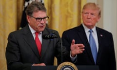 FILE PHOTO: U.S. President Trump touts administration’s environmental policy at the White House in Washington<br>FILE PHOTO: U.S. President Donald Trump listens to U.S. Energy Secretary Rick Perry speak during an event touting the administration’s environmental policy in the East Room of the White House in Washington, U.S., July 8, 2019. REUTERS/Carlos Barria/File Photo