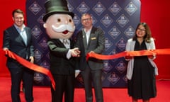 Mr Monopoly cutting the opening ribbon
