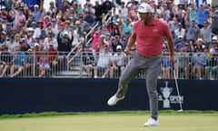 Jon Rahm reacts after making a birdie putt on the 17th hole during the fourth round of the 2021 US Open at Torrey Pines